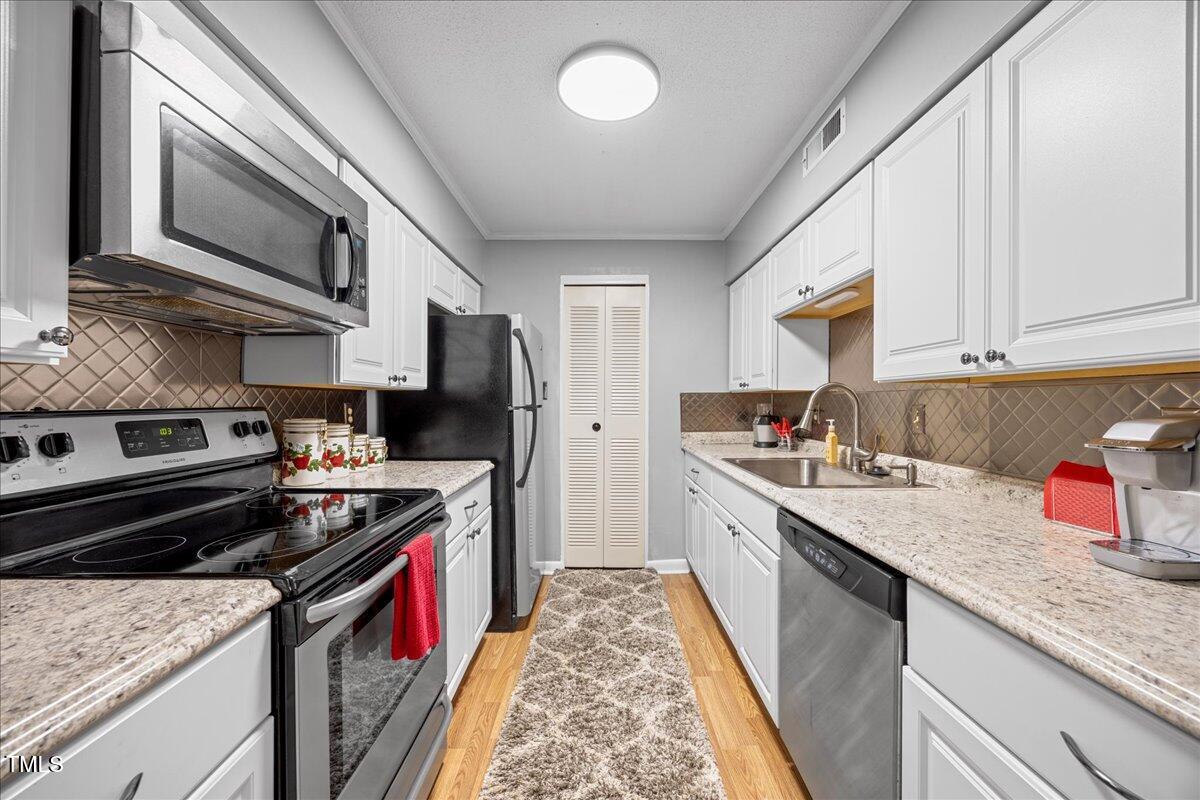 4709 Edwards Mill Road, Unit H Raleigh, NC 27612 - Photo 11 of 23 08-2A1A2978