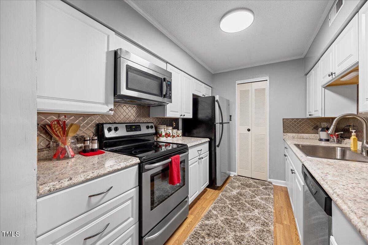 4709 Edwards Mill Road, Unit H Raleigh, NC 27612 - Photo 12 of 23 09-2A1A2981