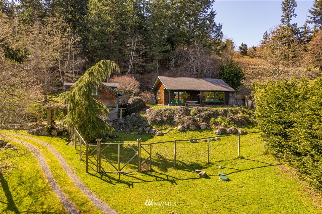 1108 Lopez Sound Road Lopez Island, WA 98261 - Photo 1 of 18 a view of a swimming pool with a patio