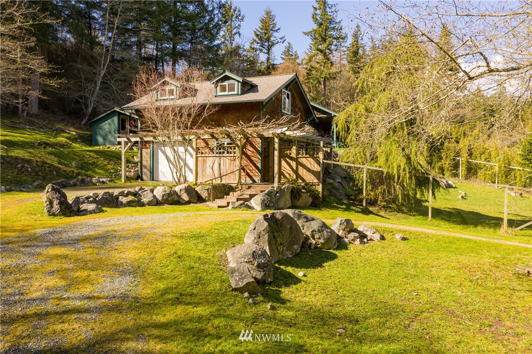 1108 Lopez Sound Road Lopez Island, WA 98261 - Photo 2 of 18 a view of a swimming pool with an outdoor space