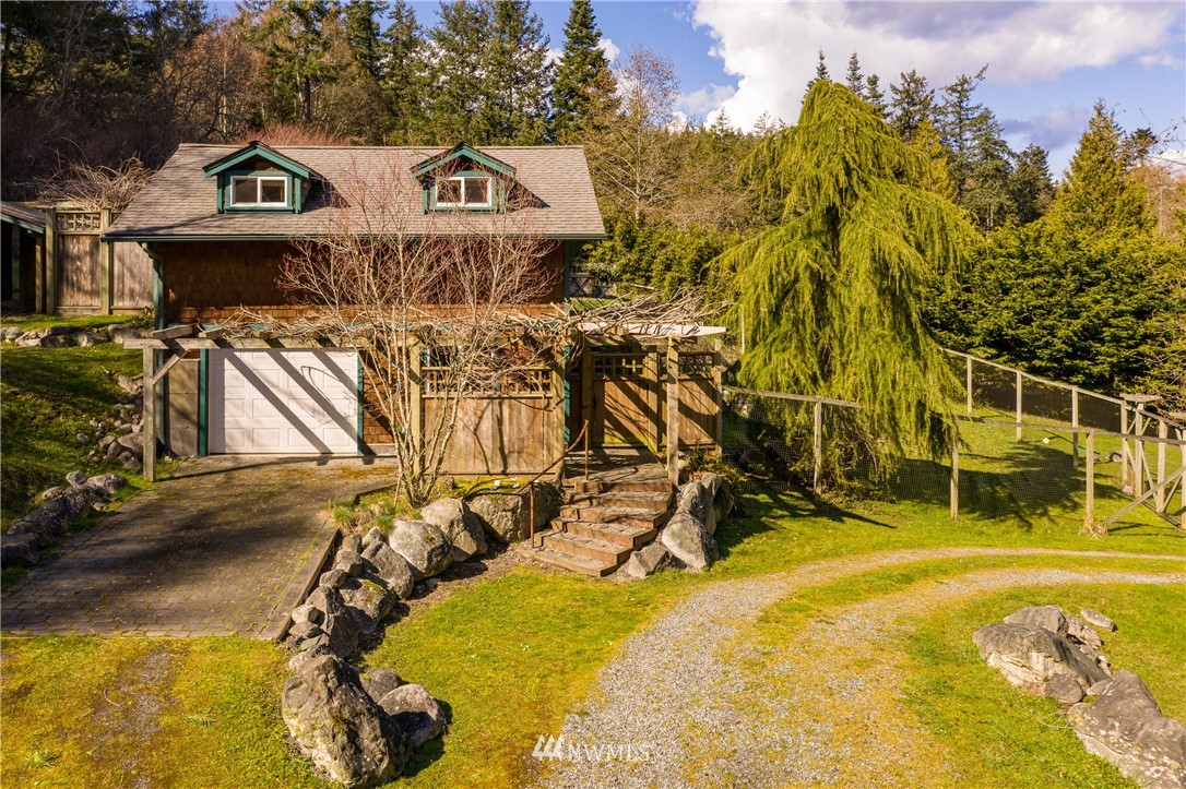 1108 Lopez Sound Road Lopez Island, WA 98261 - Photo 18 of 18 a view of a swimming pool with an outdoor space and seating area