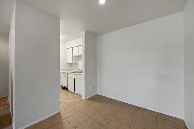 a view of a kitchen with a sink