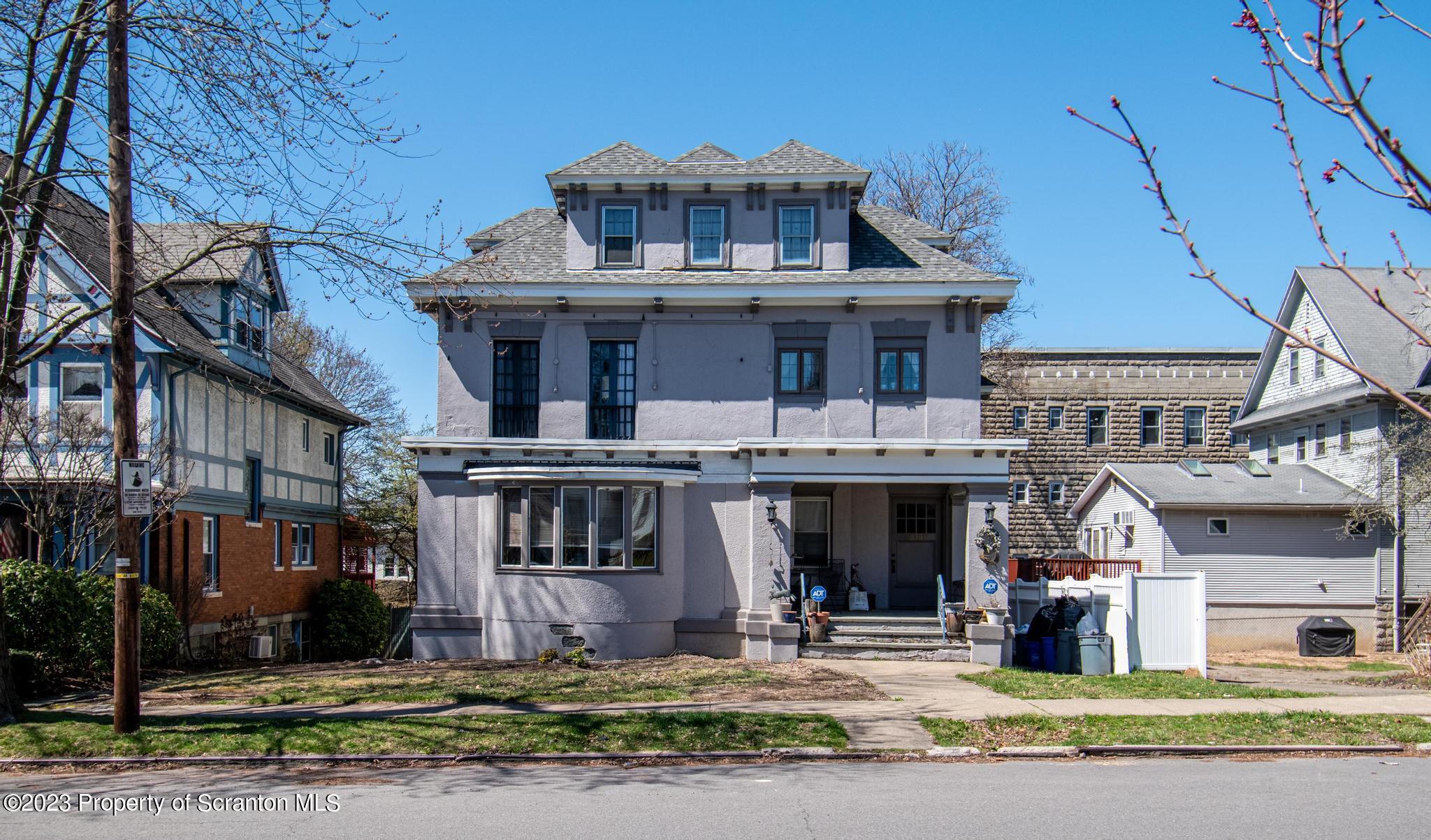 835 North Webster Avenue Scranton, PA 18510 - Photo 1 of 43 a front view of a house with a yard