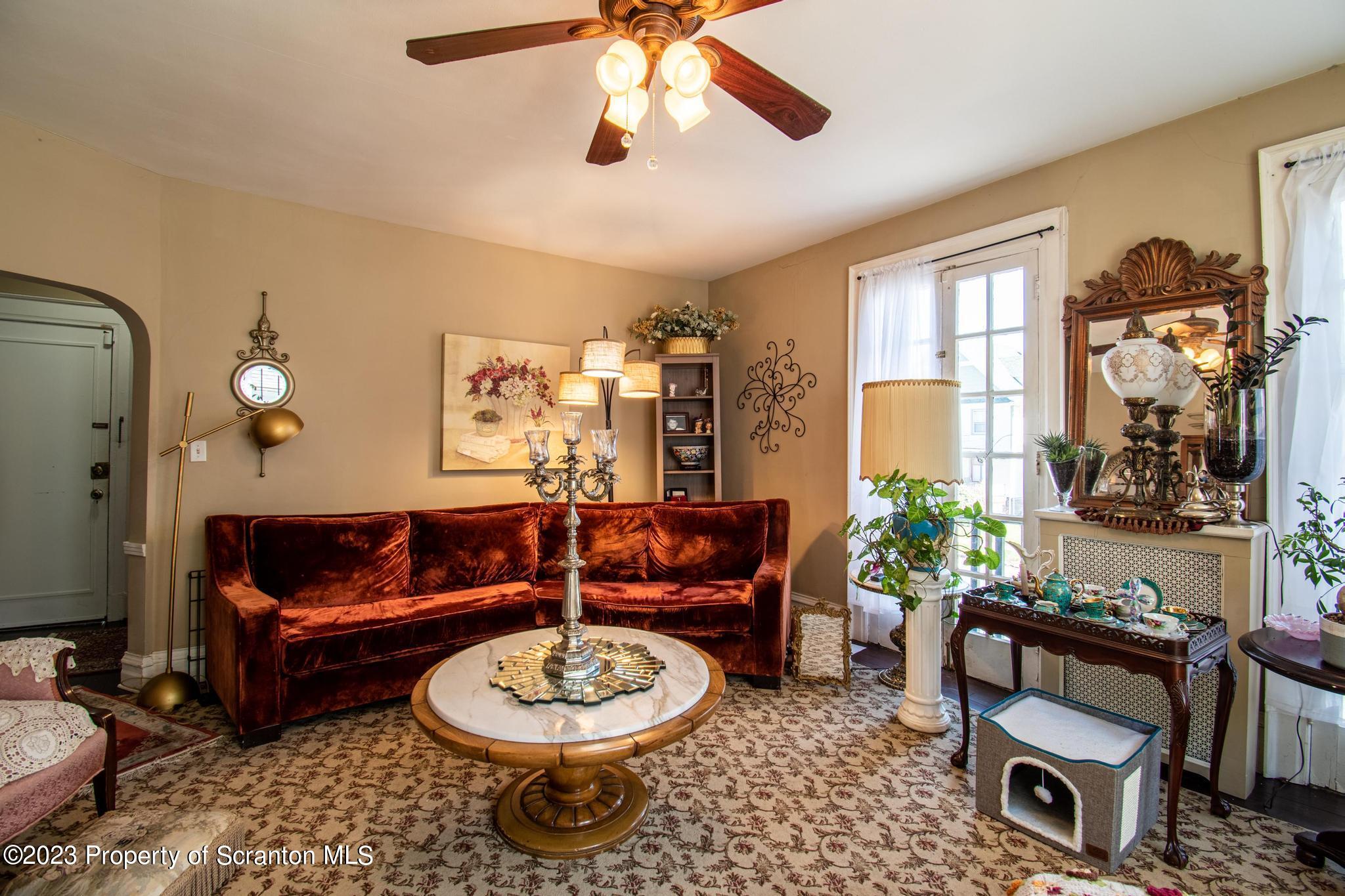 835 North Webster Avenue Scranton, PA 18510 - Photo 13 of 43 a living room with furniture and a large window