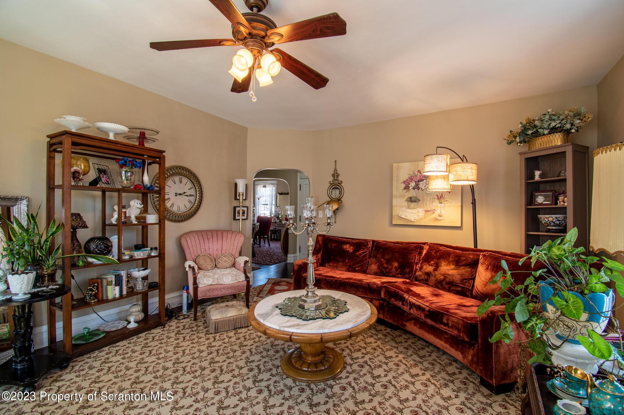 835 North Webster Avenue Scranton, PA 18510 - Photo 14 of 43 a living room with furniture and a large window