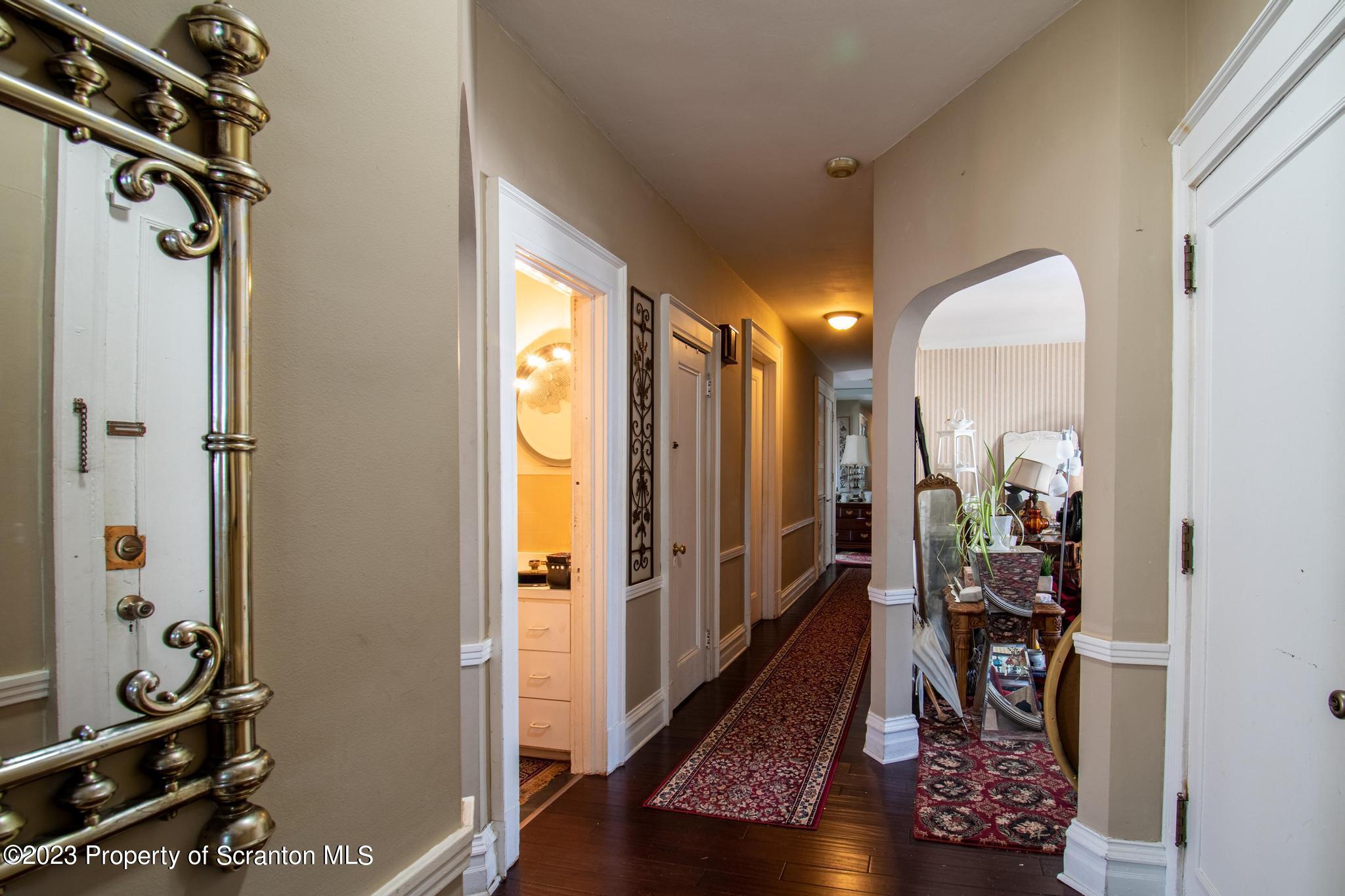 835 North Webster Avenue Scranton, PA 18510 - Photo 16 of 43 a view of a hallway with wooden floor