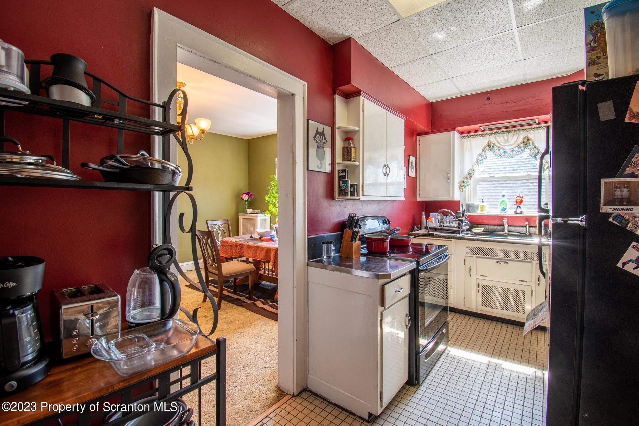 835 North Webster Avenue Scranton, PA 18510 - Photo 23 of 43 a kitchen with stove and cabinets