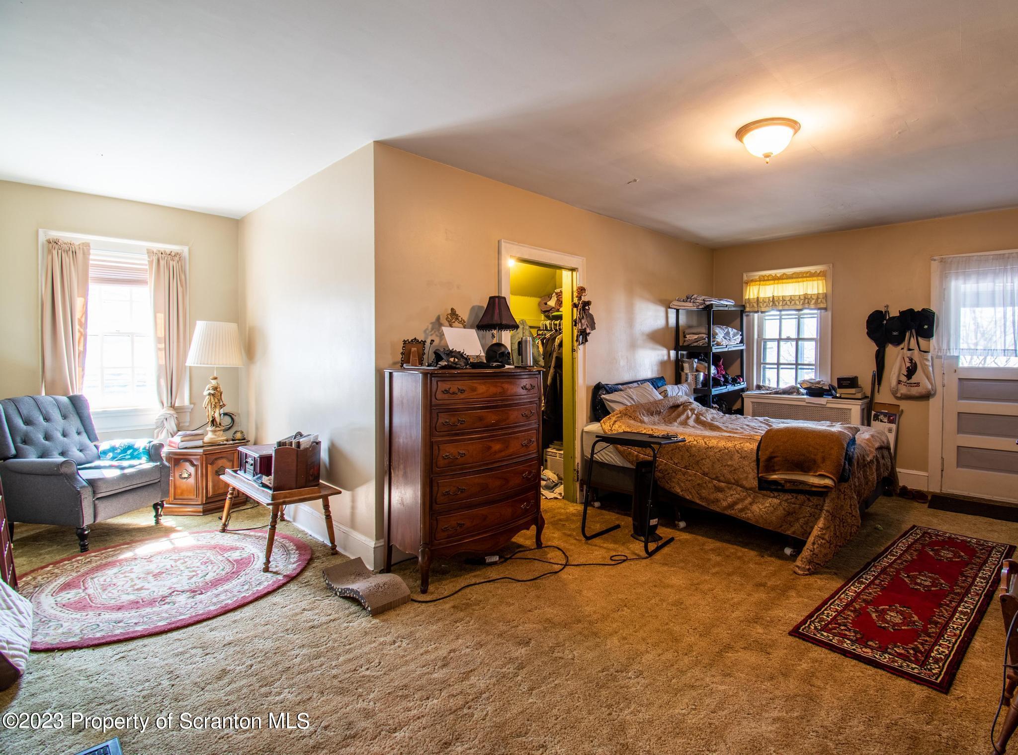 835 North Webster Avenue Scranton, PA 18510 - Photo 24 of 43 a living room with furniture and a window
