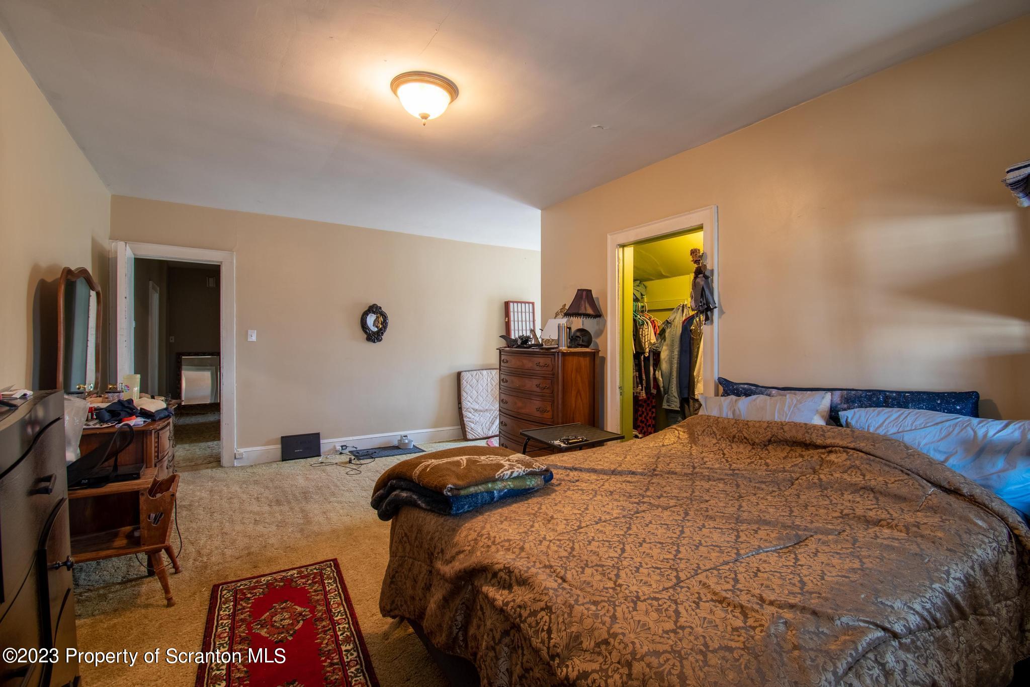 835 North Webster Avenue Scranton, PA 18510 - Photo 25 of 43 a bedroom with a bed and furniture