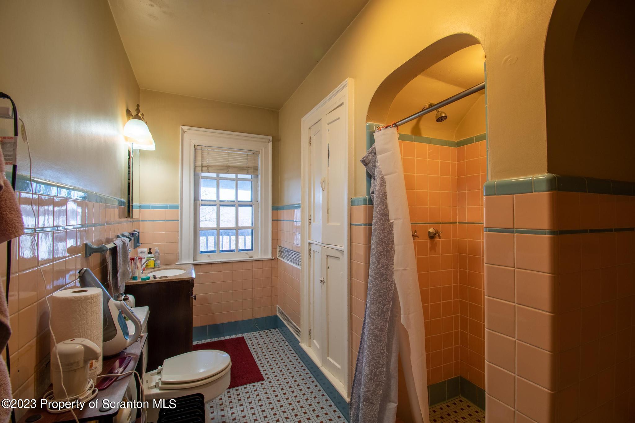 835 North Webster Avenue Scranton, PA 18510 - Photo 26 of 43 a bathroom with a sink toilet vanity and shower