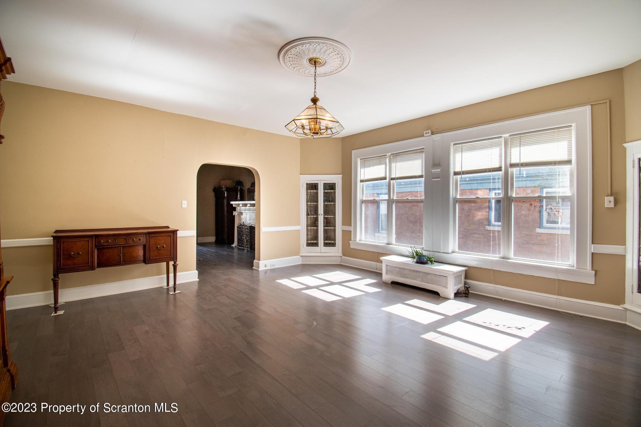 835 North Webster Avenue Scranton, PA 18510 - Photo 33 of 43 a view of livingroom with furniture wooden floor and windows