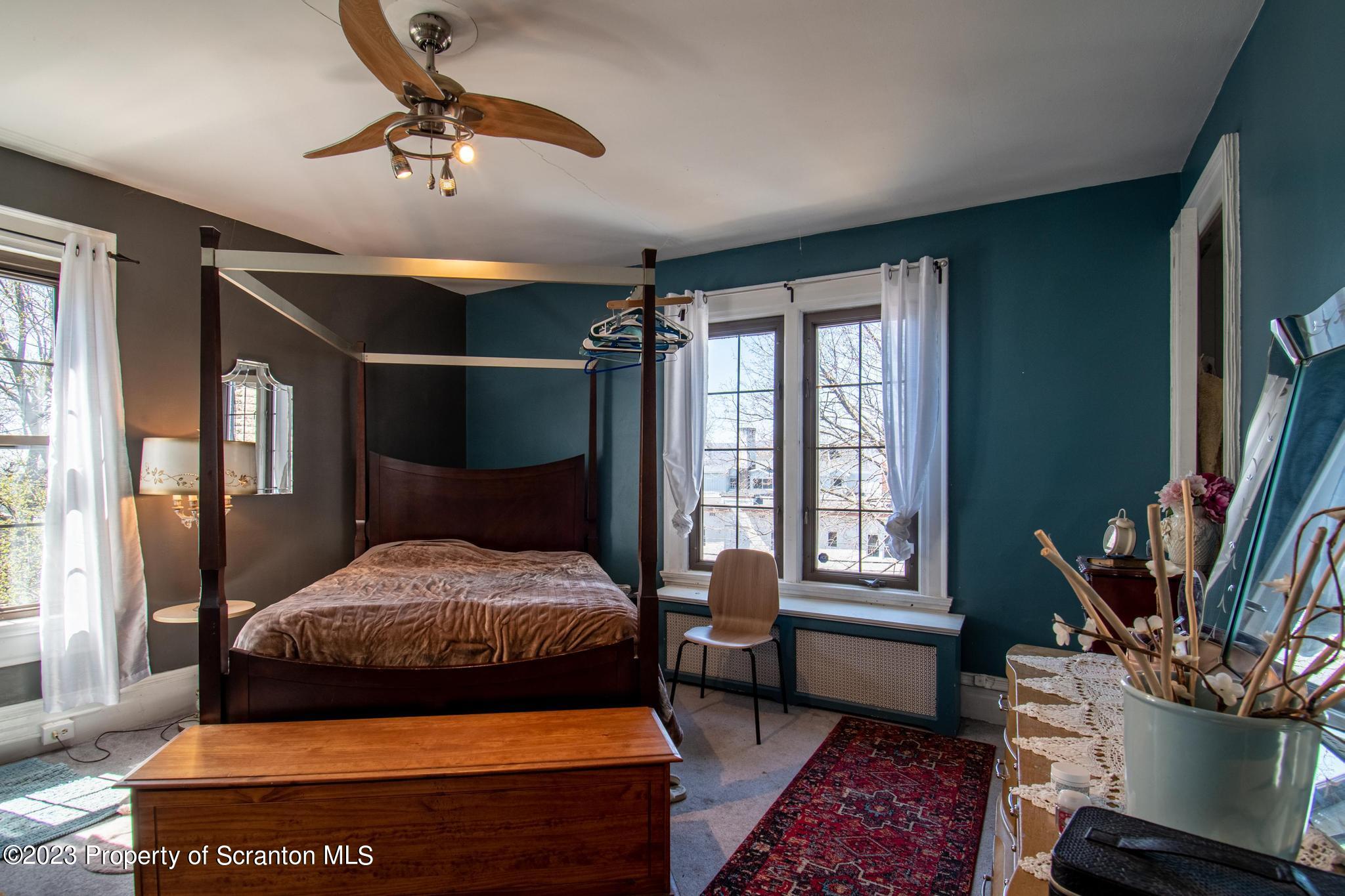 835 North Webster Avenue Scranton, PA 18510 - Photo 5 of 43 a bedroom with furniture and a window
