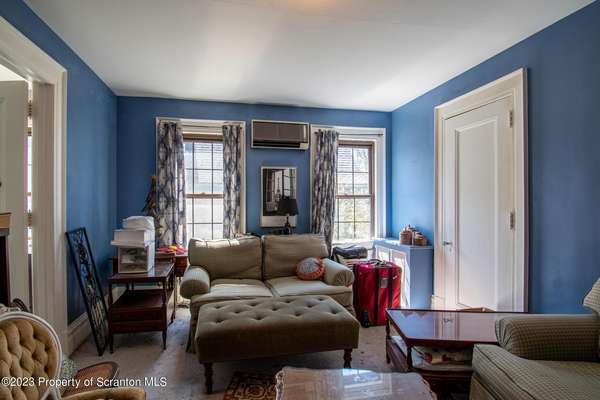 835 North Webster Avenue Scranton, PA 18510 - Photo 8 of 43 a living room with furniture and a window