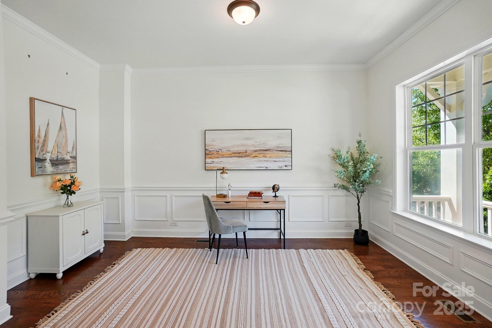 404 Brookridge Drive Mount Holly, NC 28120 - Photo 14 of 44 a view of a workspace with wooden floor and a window
