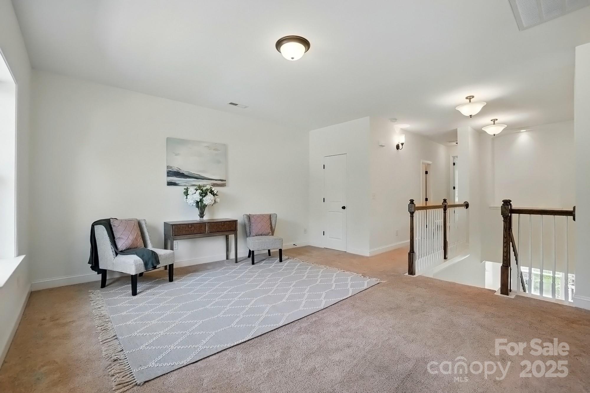404 Brookridge Drive Mount Holly, NC 28120 - Photo 22 of 44 a bedroom with a bed a desk and chair
