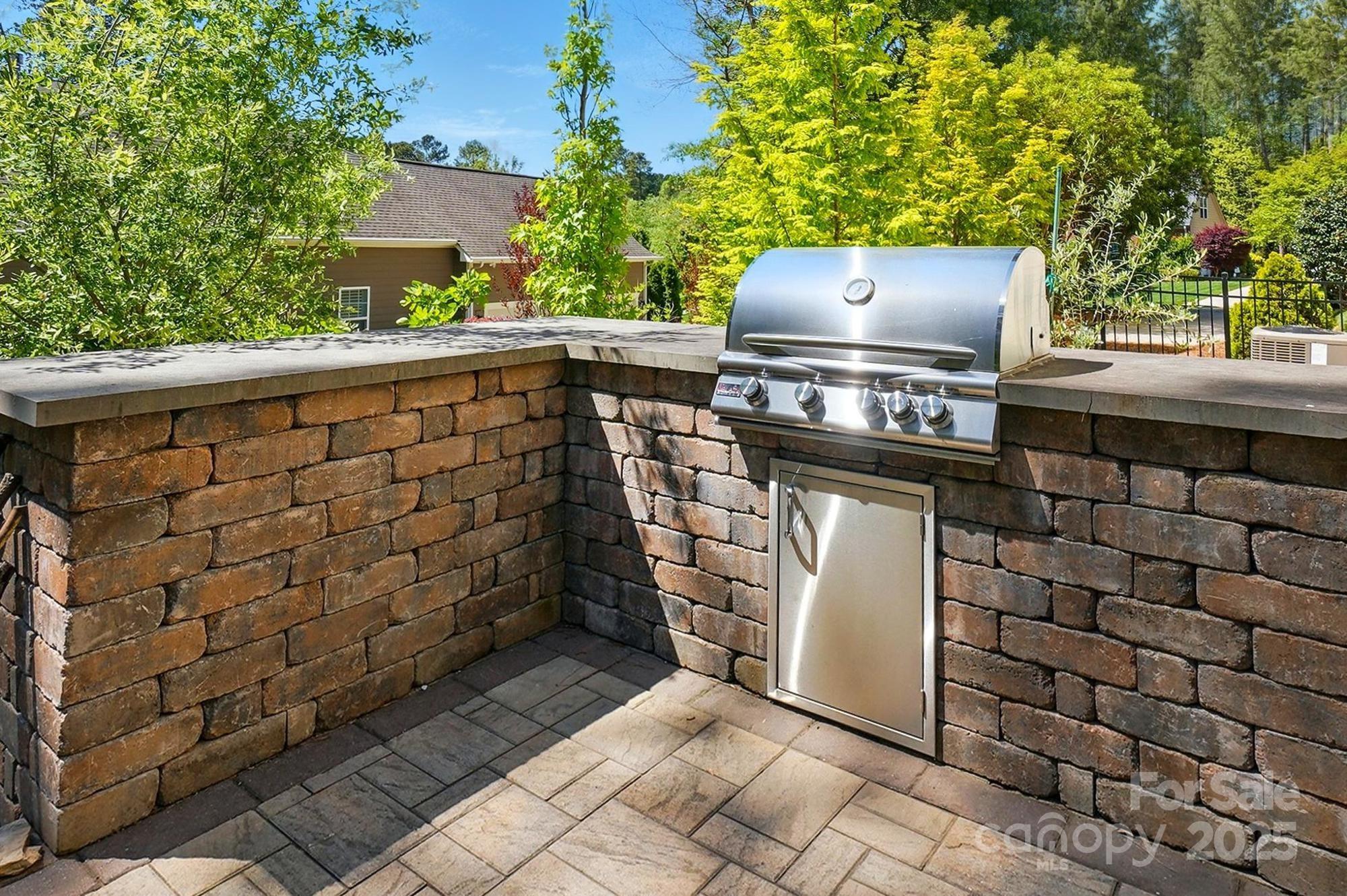 404 Brookridge Drive Mount Holly, NC 28120 - Photo 33 of 44 a view of a book shelf with wooden walls