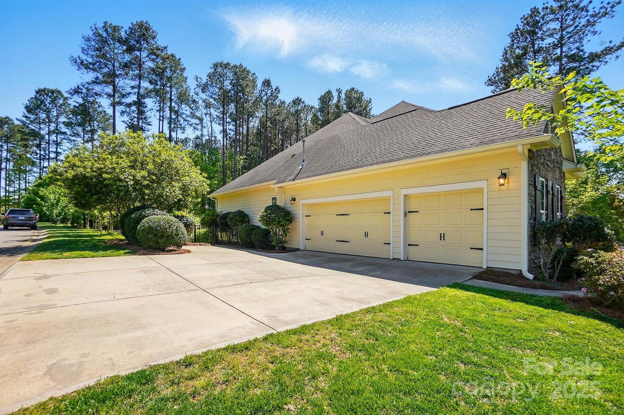 404 Brookridge Drive Mount Holly, NC 28120 - Photo 39 of 44 a backyard of a house with lots of green space