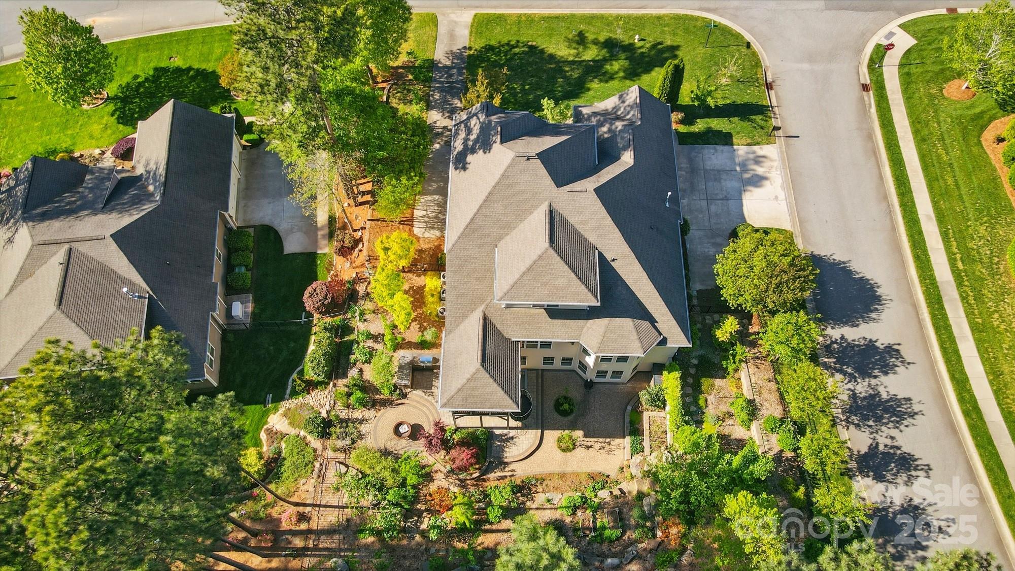 404 Brookridge Drive Mount Holly, NC 28120 - Photo 4 of 44 an aerial view of a house with swimming pool and garden