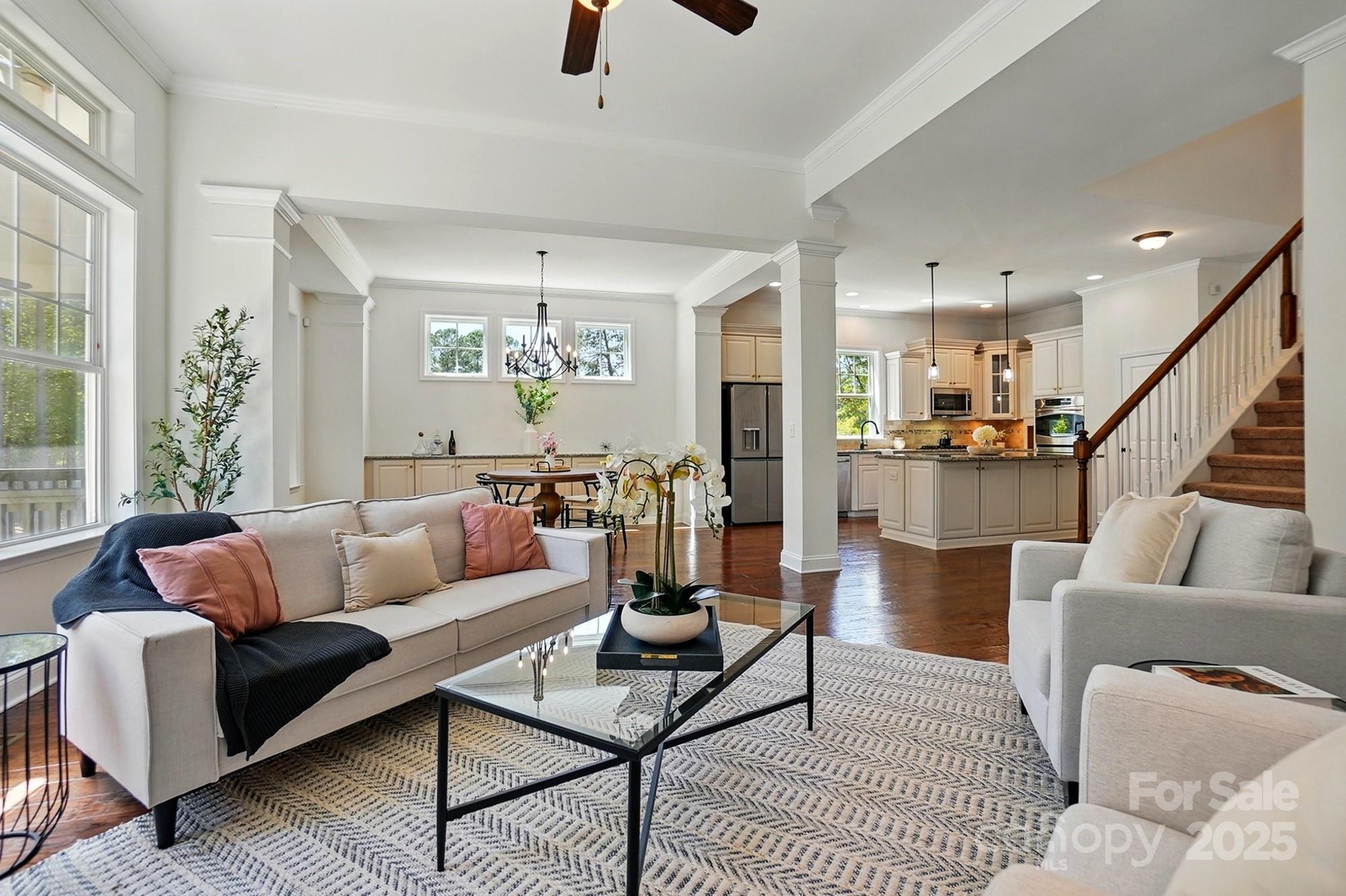 404 Brookridge Drive Mount Holly, NC 28120 - Photo 7 of 44 a living room with furniture and wooden floor