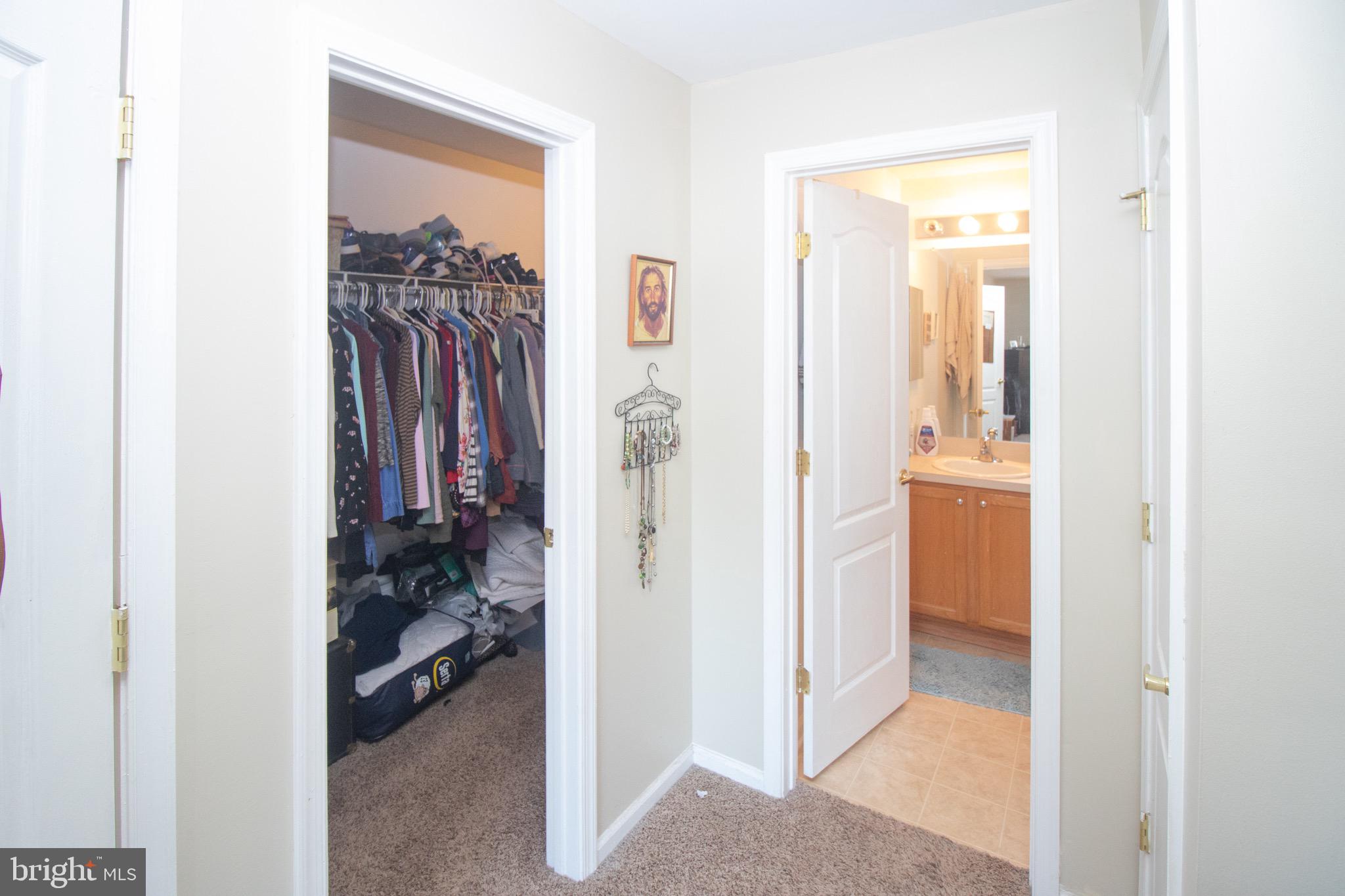 219 Lawrence Lane Riverside, NJ 08075 - Photo 12 of 23 a view of a bedroom from a hallway