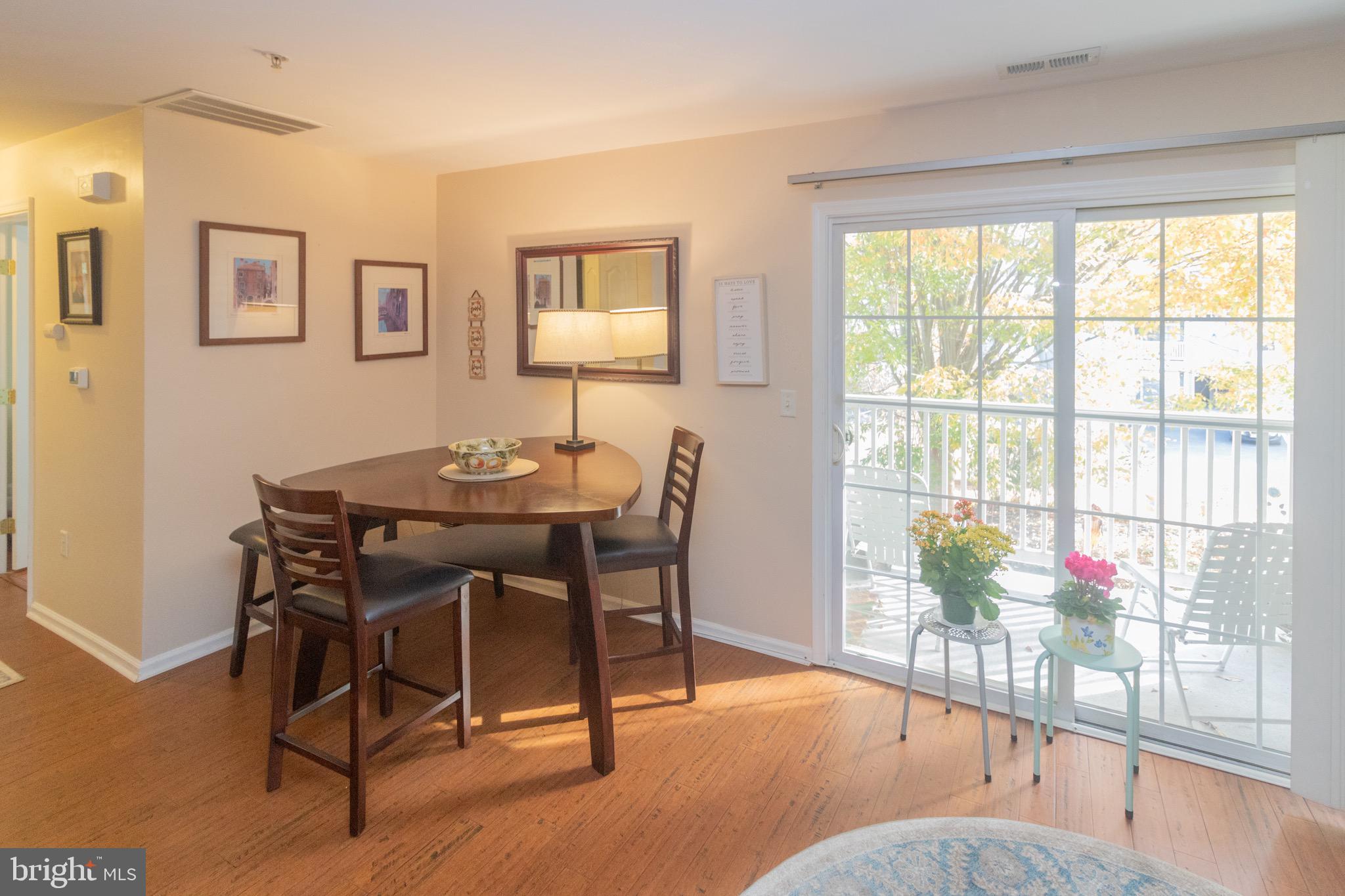 219 Lawrence Lane Riverside, NJ 08075 - Photo 6 of 23 a dining room with furniture and wooden floor