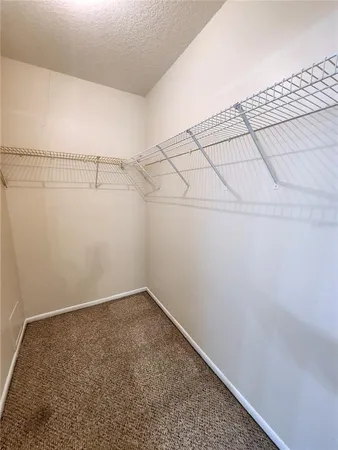 a view of a room with racks on the wall