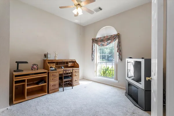 a view of a livingroom with furniture