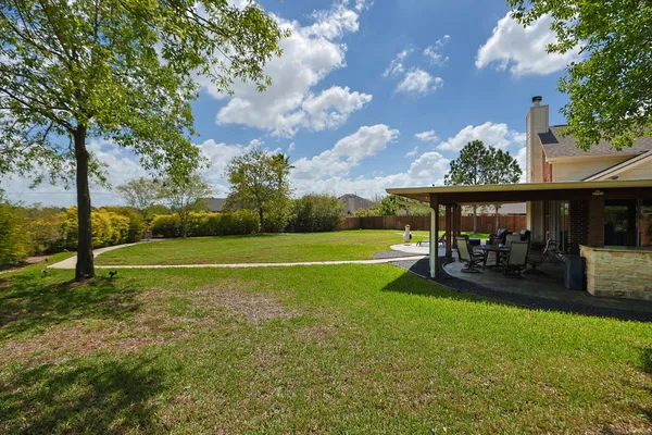 $569,000 | 9102 Night Beacon Point Drive, Spring, TX 77379