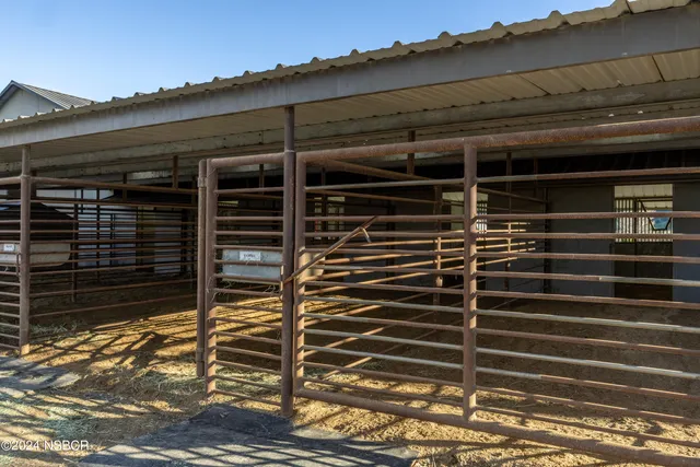 a view of outdoor space with playground and green space