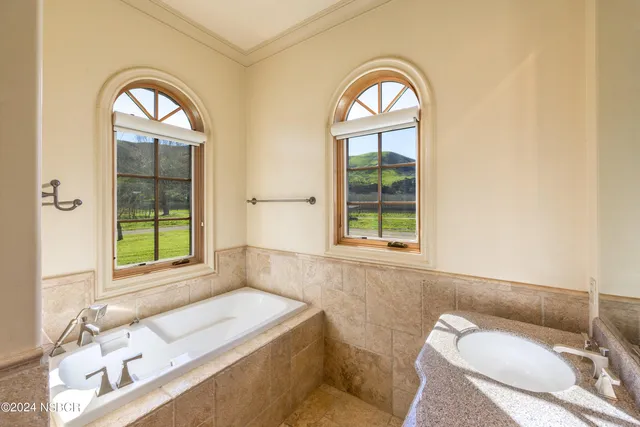 a view of a lake with a yard