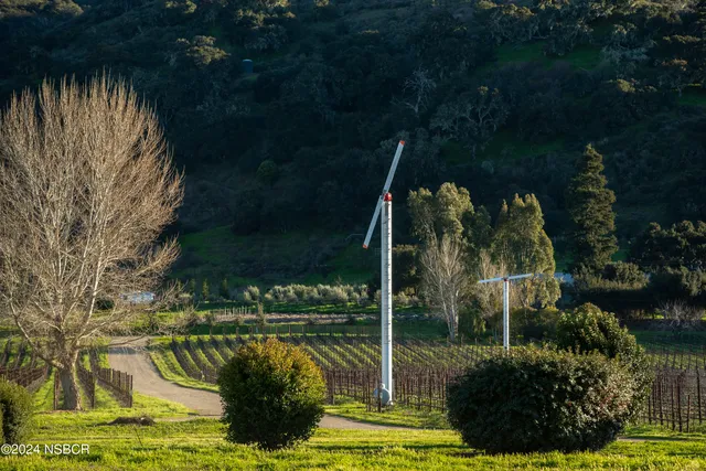 a view of swimming pool from a lake view