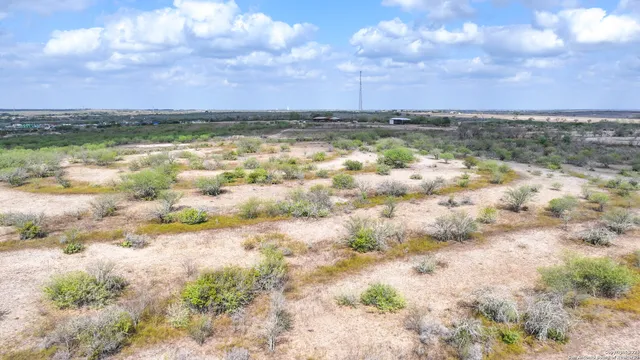 a view of lake with sunset