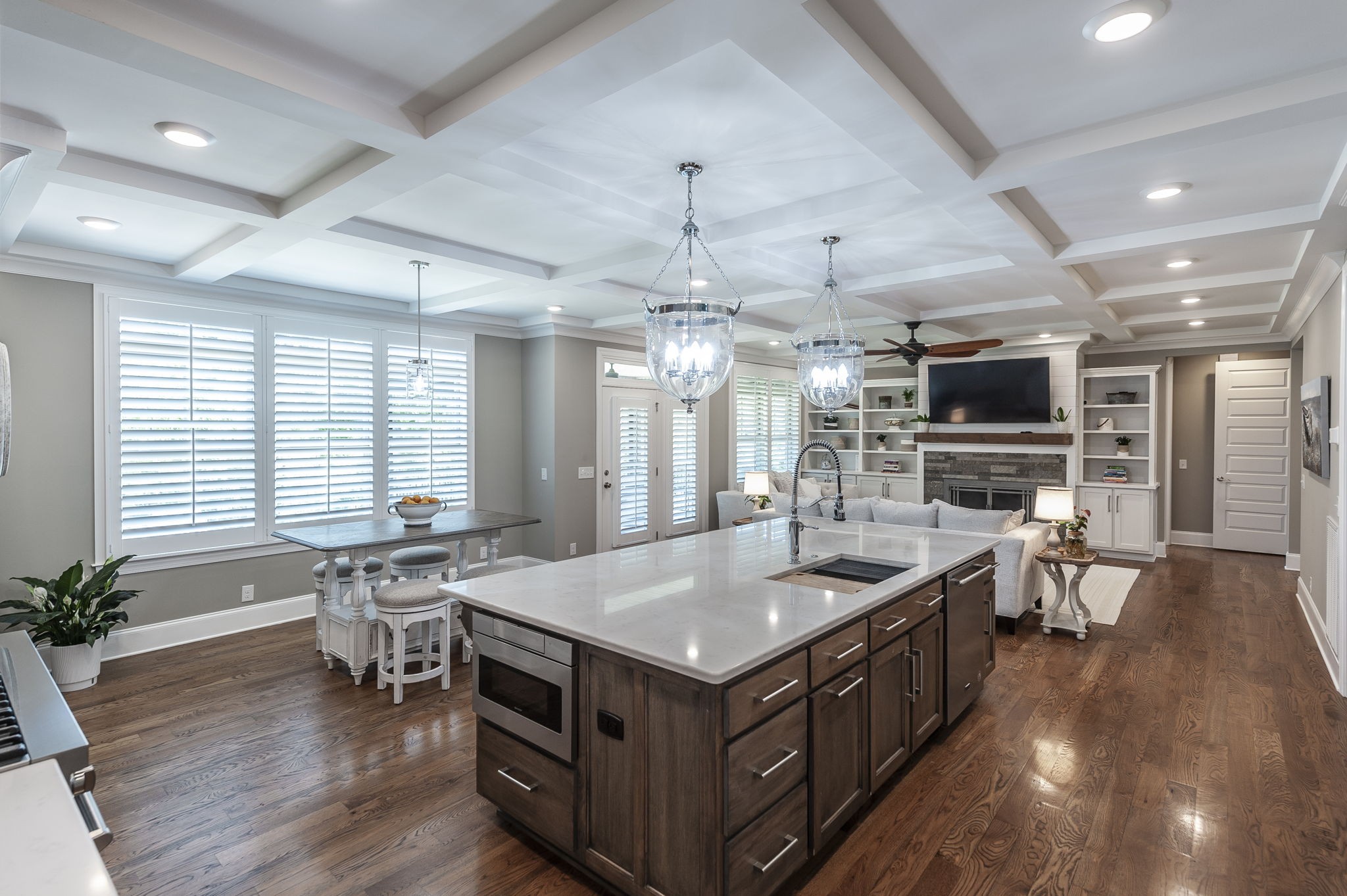 872 Douglas Bend Road Gallatin, TN 37066 - Photo 18 of 80 a kitchen with a stove center island and a wooden floor