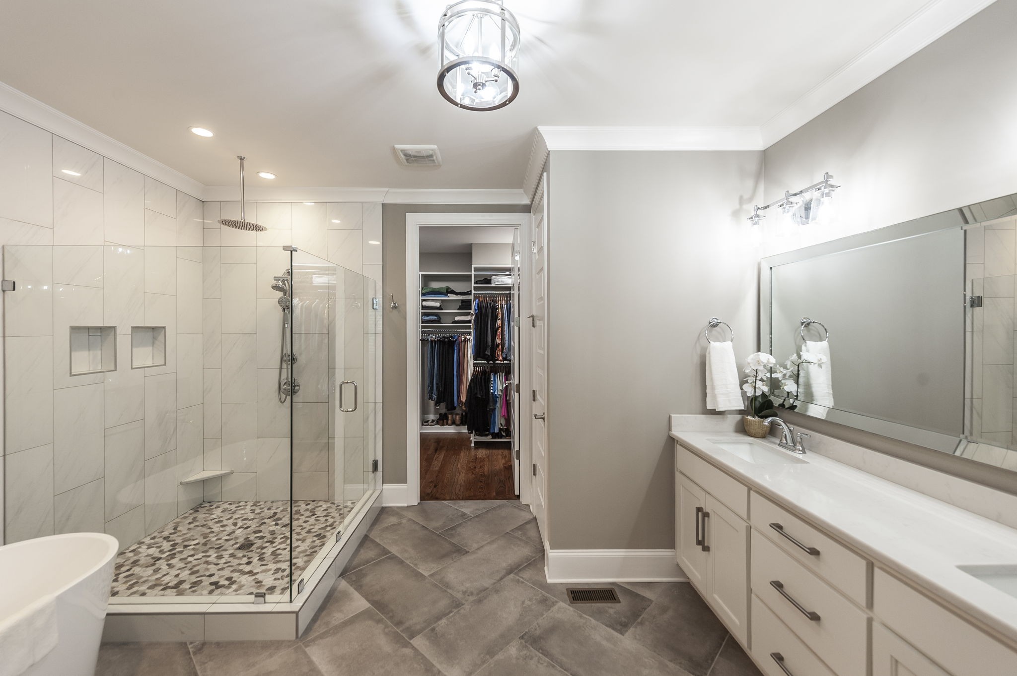 872 Douglas Bend Road Gallatin, TN 37066 - Photo 26 of 80 a bathroom with a double vanity sink a toilet and shower