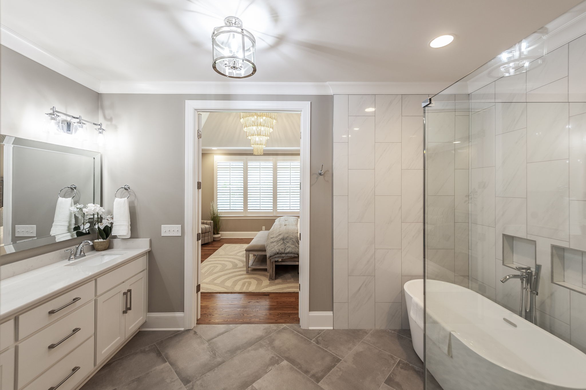 872 Douglas Bend Road Gallatin, TN 37066 - Photo 34 of 80 a spacious bathroom with a double vanity sink a large mirror and a bathtub
