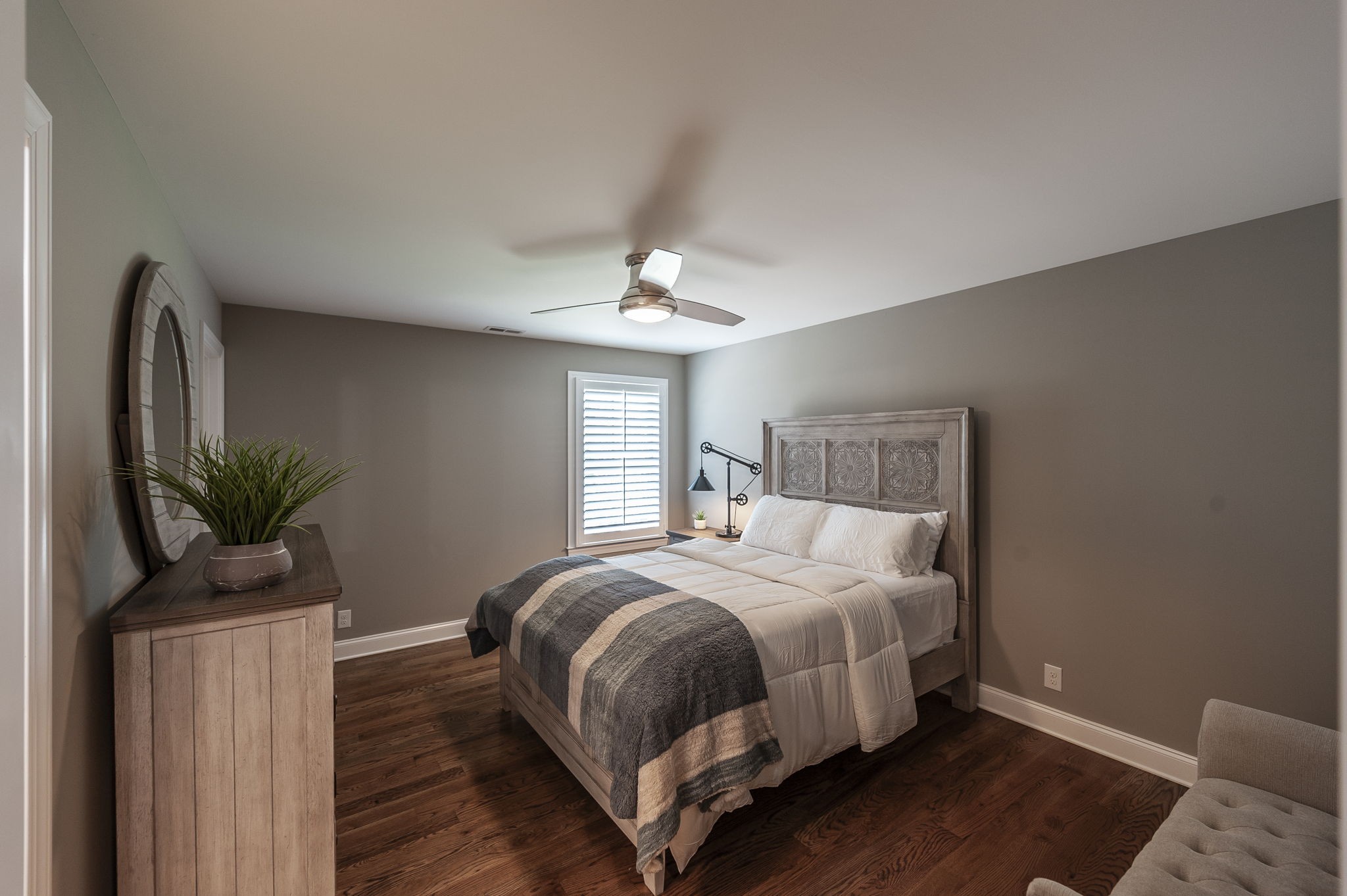 872 Douglas Bend Road Gallatin, TN 37066 - Photo 36 of 80 a bedroom with a large bed and a chandelier