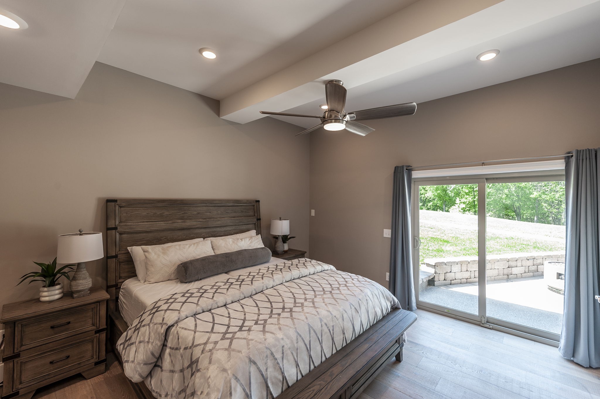 872 Douglas Bend Road Gallatin, TN 37066 - Photo 61 of 80 a bedroom with a large bed and a lamp
