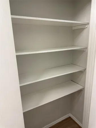 a utility room with washing machine