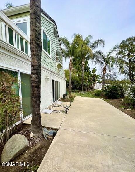 486 Algonquin Drive Simi Valley, CA 93065 - Photo 12 of 13 a backyard of a house with table and chairs