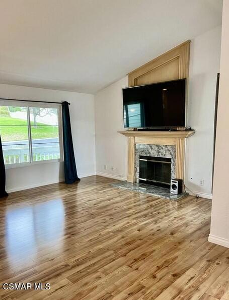 486 Algonquin Drive Simi Valley, CA 93065 - Photo 2 of 13 a view of empty room with wooden floor and fireplace