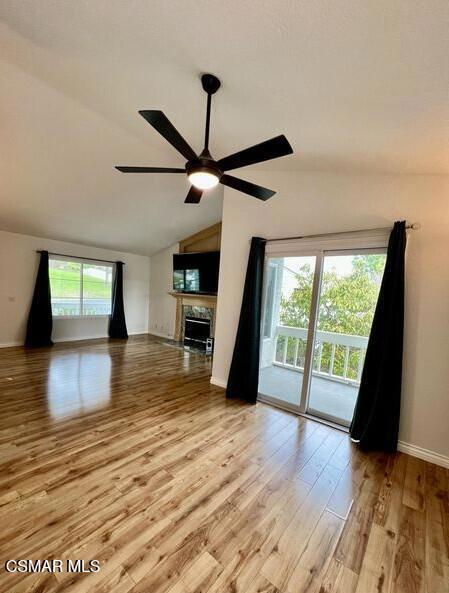 486 Algonquin Drive Simi Valley, CA 93065 - Photo 4 of 13 a view of a livingroom with wooden floor and a ceiling fan
