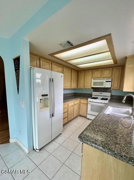 486 Algonquin Drive Simi Valley, CA 93065 - Photo 5 of 13 a kitchen with stainless steel appliances granite countertop a refrigerator and a sink