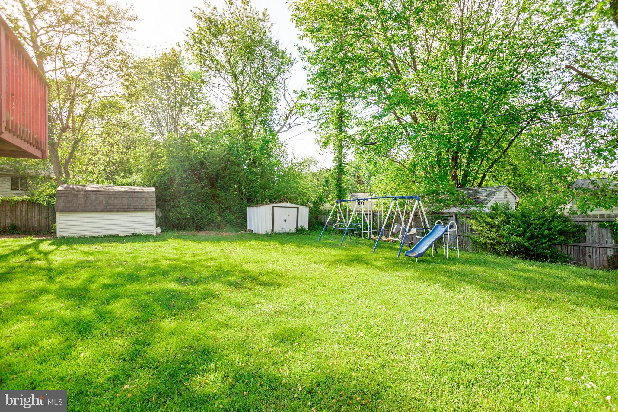 252 Sycamore Road Elkton, MD 21921 - Photo 14 of 17 Fenced backyard facing playset & detached storage