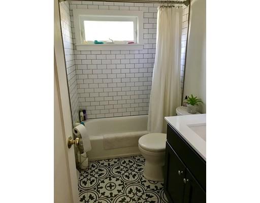 94 Brookside Road Rockland, MA 02370 - Photo 8 of 22 a bathroom with a sink a toilet and shower
