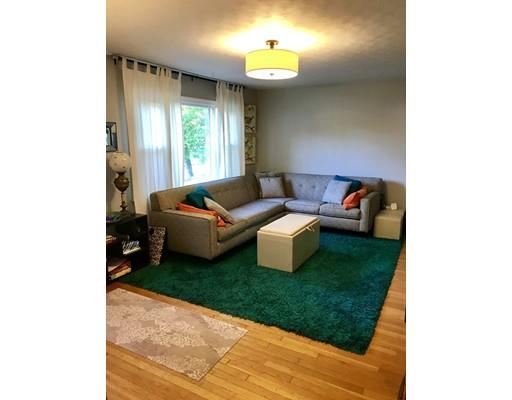 94 Brookside Road Rockland, MA 02370 - Photo 10 of 22 a living room with furniture and a large window