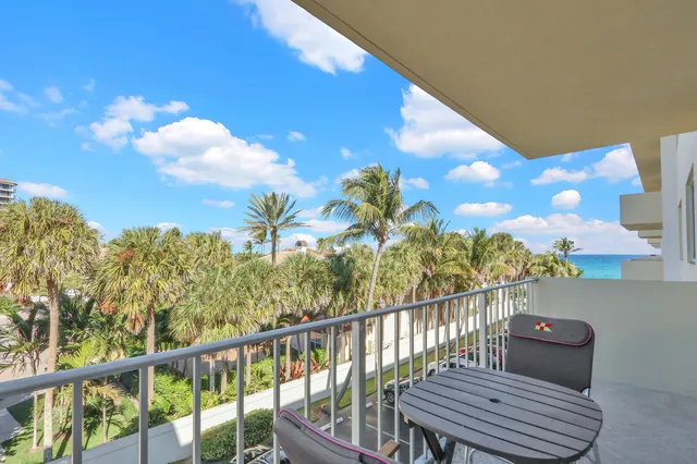 a view of a house with roof deck