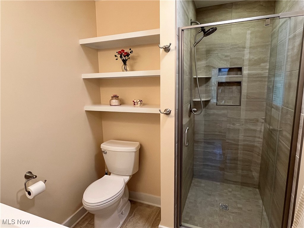3252 Stanley Road Akron, OH 44333 - Photo 11 of 22 Bathroom off of primary bedroom with a stall shower