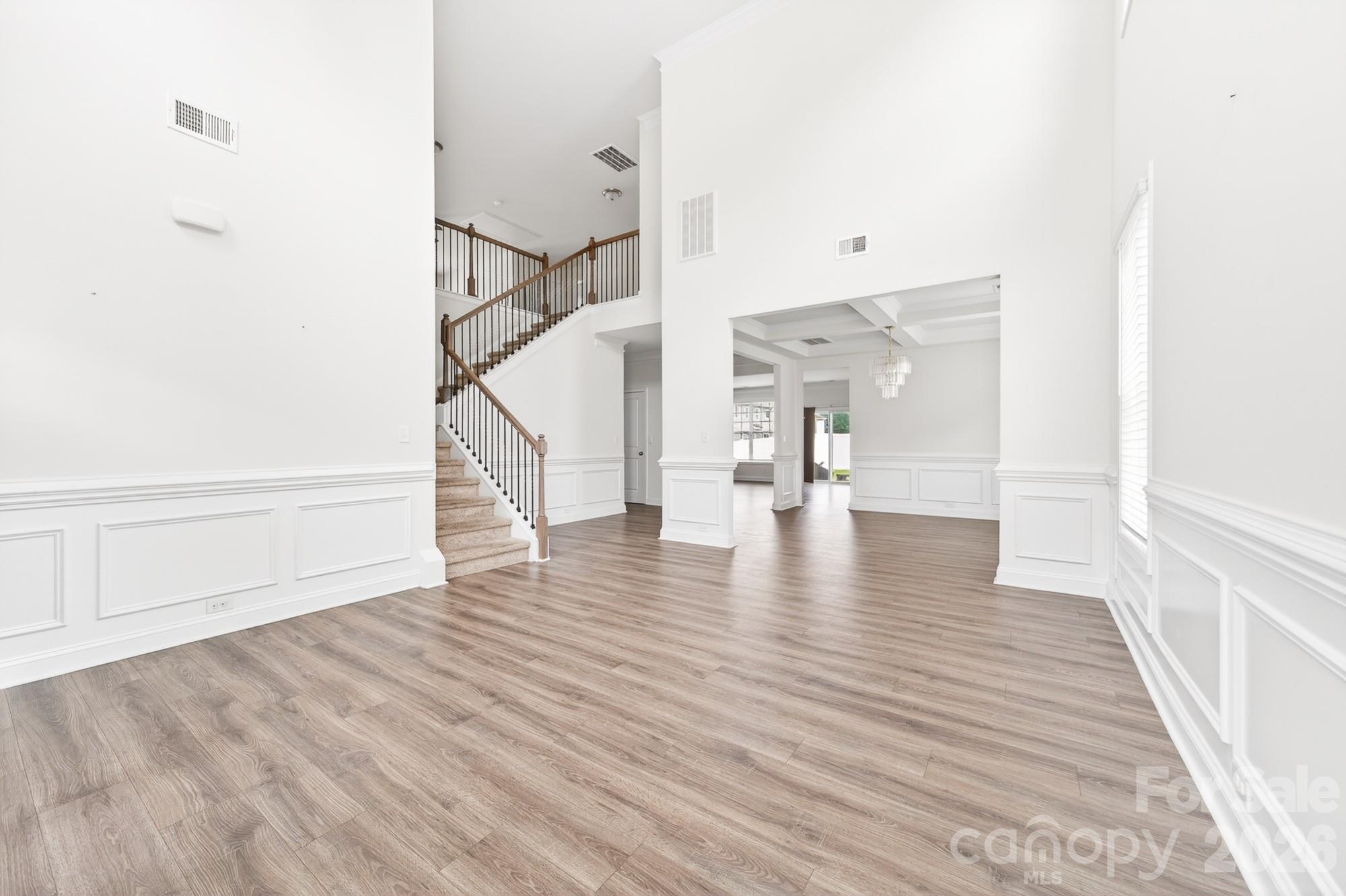 5972 Redwood Pine Road Concord, NC 28027 - Photo 6 of 37 a view of entryway with wooden floor