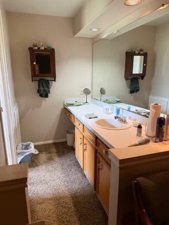 a utility room with a sink dryer and washer