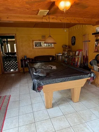 a kitchen with stainless steel appliances granite countertop a sink and a stove